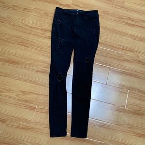 Black high rise skinny jeans,as it looks. Great condition
